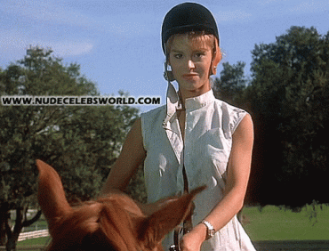 Sex Gif - Busty b-movie star Betsy Russell flashes her big boobs on horse gif