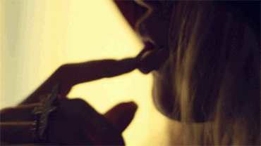 Sex Gif - Sensual blonde licking her finger