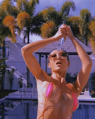 Sex Gif - Sexy Asian Bikini Babe Gets Oiled