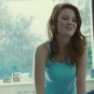 Sex Gif - teasing by flashing her boobs