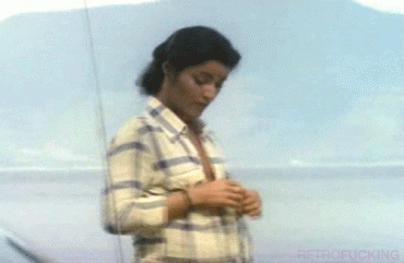 Sex Gif - 80's Latina Actress with tanlines and small tits undressing on the beach
