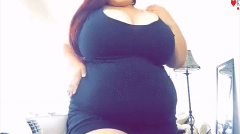 Black dress BBW teases with her body