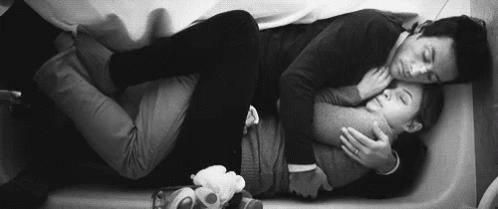 Cuddling in the bath, with our clothes on