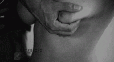 Sex Gif - dressed man squeezes breast of his lover
