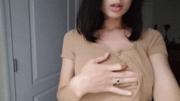 Sex Gif - Sexy brunette let loose her big tits