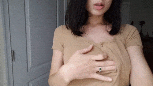 Sexy brunette let loose her big tits