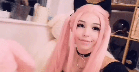 Belle Delphine pink hair cuddling giant pink stuffie